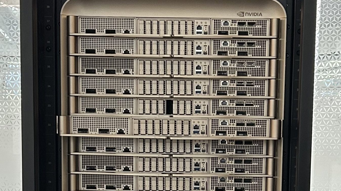 Gold-coloured server trays stacked in an Nvidia GB200 liquid-cooled rack