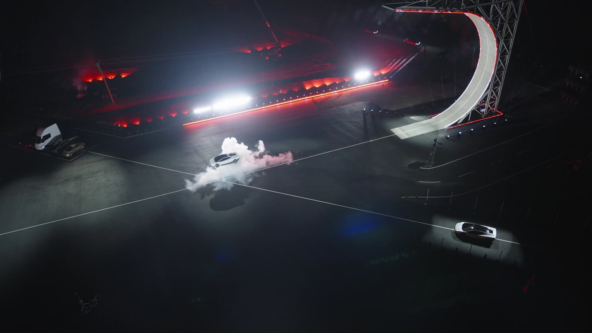 The Roadster landing on its thrusters near the ramp at night