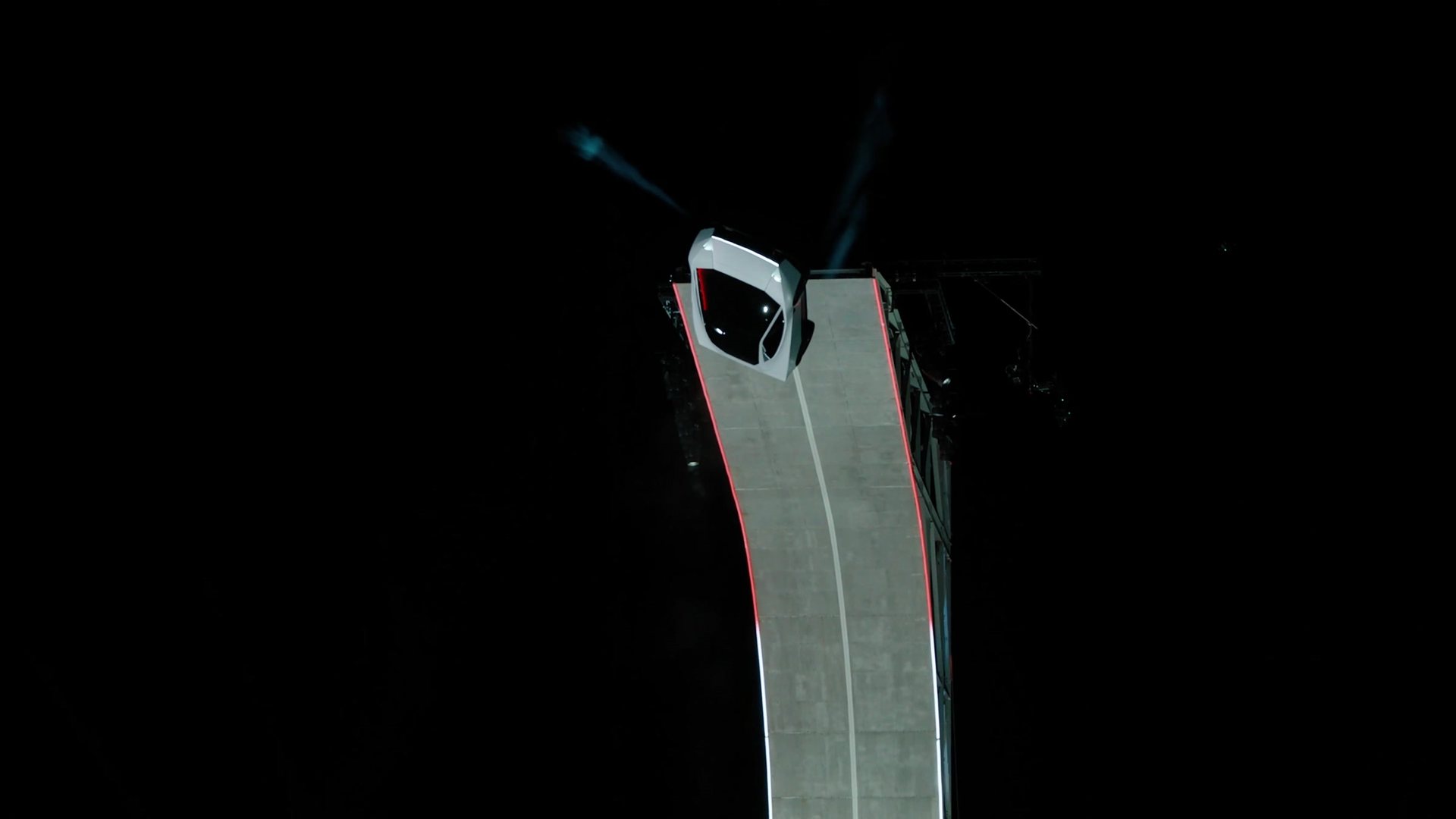 The Roadster stopped upside down at the top of the curved ramp
