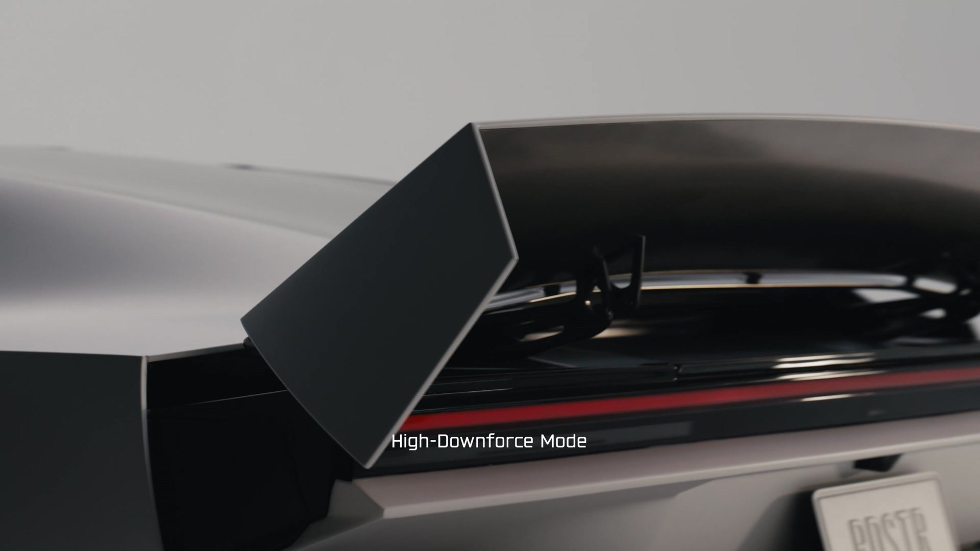 Close-up of the Roadster rear wing raised in High Downforce Mode
